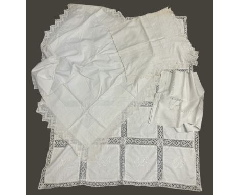 Two boxes of antique and vintage linens to include drawnwork tablecloths amongst others. All in good vintage condition with s