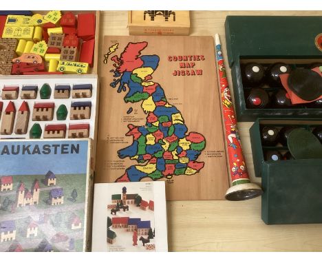 Vintage childrens toys and games to include Boxed complete carpet bowls and boules game toys and a series of wooden toys to i