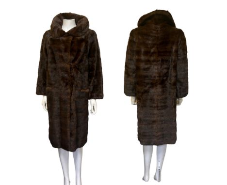 A vintage 1970s ranch mink coat, very floppy and lightweight, with patch pockets. and chocolate satin lining by Saito Furs, T