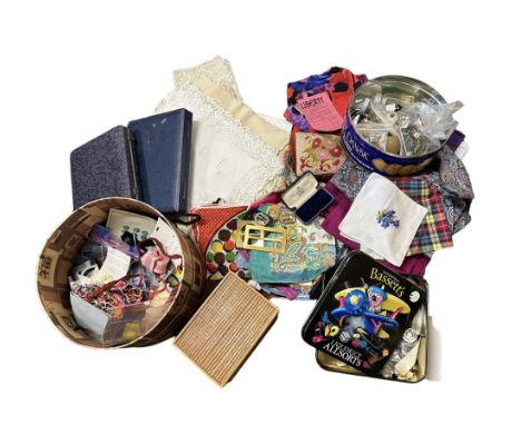 A mixed lot of vintage items to include biscuit and sweet tins with haberdashery items, an oak folding wooden cake stand, var