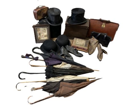 A collection of vintage and antique umbrellas, parasols, top hats and bags etc to include a purple silk parasol with cloisonn