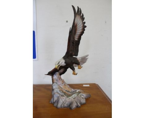 An Alaskan Bald Eagle ceramic model titled 'Lord of the Skies' 