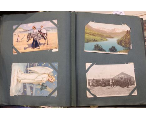 A postcard album and contents to include First World War photographics 