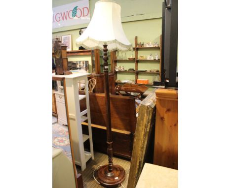 An oak standard lamp tasselled shade 