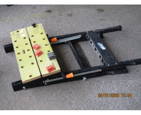 ADJUSTABLE WORK BENCH
