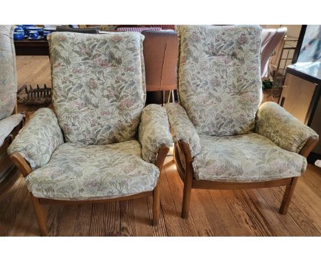 A matching pair of Ercol armchairs 