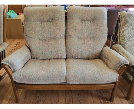 An Ercol two seater sofa 