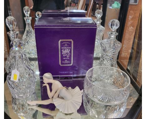 An Edinburgh Crystal decanter with box, two other decanters, all with stoppers, glass bowl 20cm diameter and a Lladro seated 