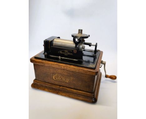 A Thomas Edison phonograph serial number 113605 with two boxes of 87 discs and a speaker.
