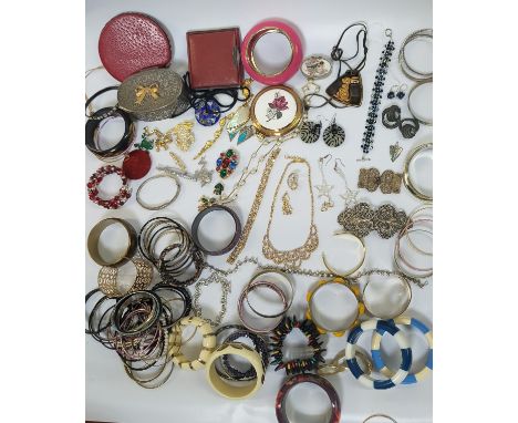 Costume jewellery including earrings, pendants, necklaces, frog brooches, a silver Art Deco pendant, a Links bracelet, bangle