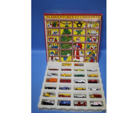 A VINTAGE BOXED CORGI TWENTY FOUR VEHICLE ADVENTURES TO CHRISTMAS SET