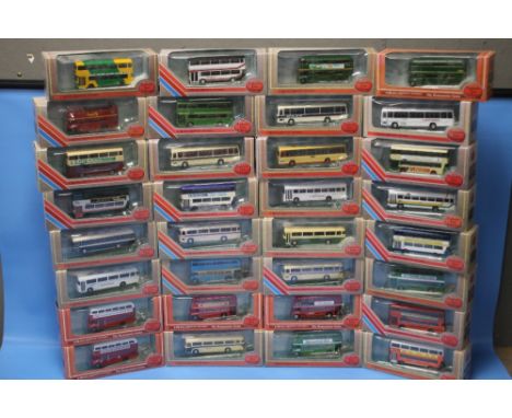 THIRTY TWO BOXED EXCLUSIVE FIRST EDITION BUSES AND COACHES, 1:76 Scale.