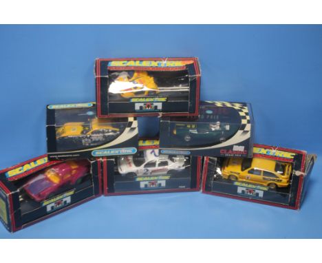 SIX BOXED SCALEXTRIC SLOT CARS to include Vauxhall F1, TVR Tuscan 400R Peninsular, Ford Mondeo C579, Monroe Cosworth C169, Jo