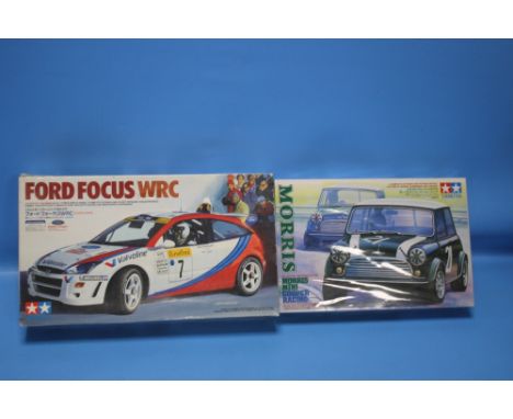 TAMIYA MODEL CAR KITS 1:24, to include Ford Focus WRC and Morris Mini Cooper Racing (2)