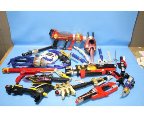 A LARGE BOX OF VINTAGE POWER RANGERS WEAPONS