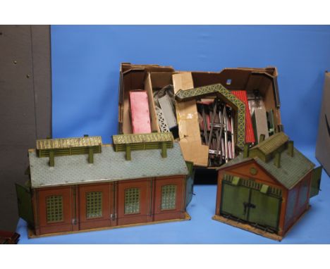 A PAIR OF VINTAGE HORNBY 'O' GAUGE TINPLATE ENGINE SHEDS, (large 46 cm long, small 23 cm long), tin plate signal box, tin pla