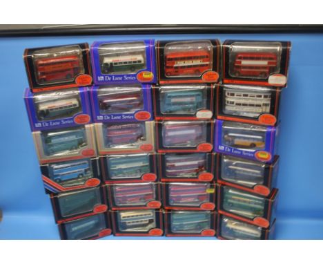 TWENTY FOUR BOXED EXCLUSIVE FIRST EDITION 1: 76 SCALE DIE CAST COACHES AND BUSES.