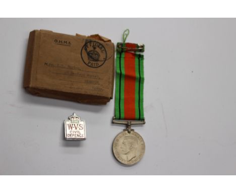 World War Two British Defence medal mint, boxed with WVS badge to 'Mrs K R Burton' of Beeston, Notts