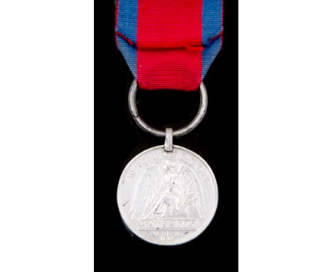 A Waterloo medal named to John Menzies of the 71st Foot, naming of the medal is privately impressed, the medal itself has bee