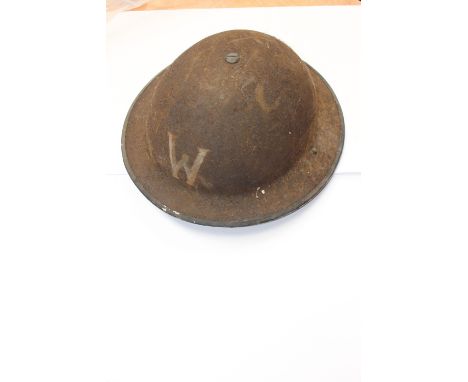 A World War Two Warden's helmet MKII shell with MKI liner and MKII chin straps 