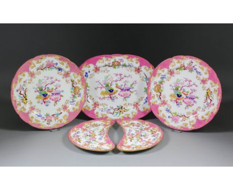 An early 20th Century Minton's bone china part dinner service for Harrods Ltd, printed and painted with an Oriental design of