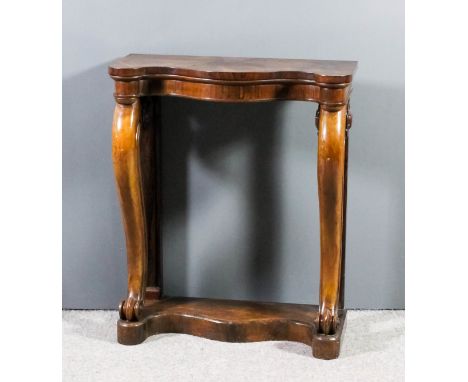 A Victorian rosewood serpentine fronted console table, on bold scroll front supports and conforming base, 30ins wide x 13.5in