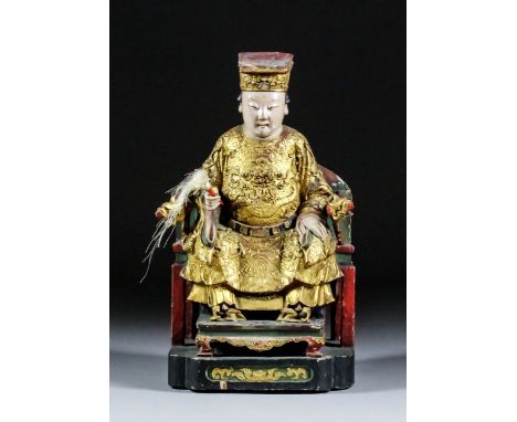 A Chinese carved polychrome and giltwood seated figure of Zhu Sheng Niang Niang - The Lady who Registers Births - The Midwife