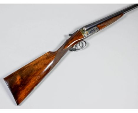 A 12 bore side by side shotgun by AYA, Model No. 4, Serial No. 529819, the 28ins blued steel barrels with plain top rib, with