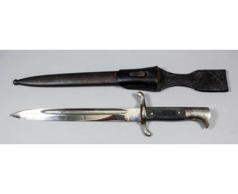 A German World War II Police dress bayonet, the 10ins bright steel blade with maker's mark for Carl Eickhorn, Solingen, with 