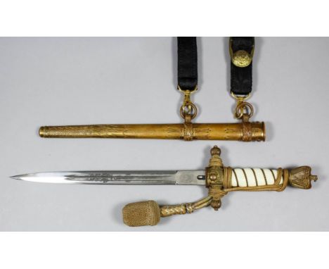 A German World War II Kriegsmarine Naval Officer's dress dagger, the 10ins bright steel double edged blade etched with anchor