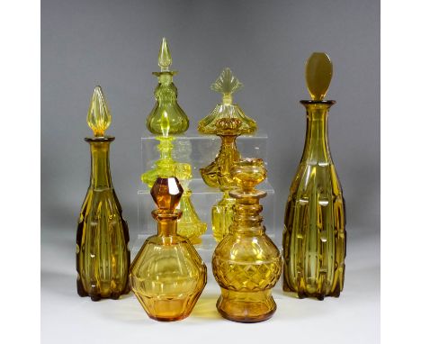A collection of yellow glassware, including a diamond and panel cut decanter with mushroom stopper, 8.75ins high, oval servin
