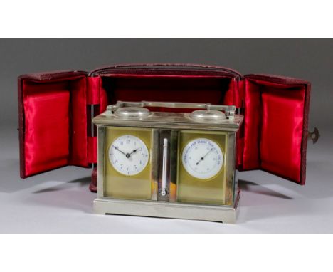 An early 20th Century French carriage style desk timepiece, barometer, thermometer and compass, the twin 1.875ins diameter wh