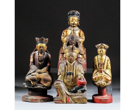 A Chinese documentary carved painted and giltwood seated figure of Guanyin in lotus pattern base and red painted plinth, 8.5i