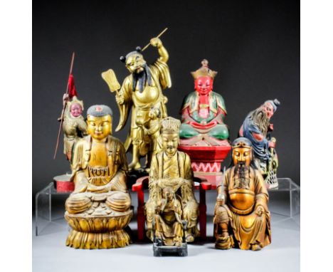 A Chinese carved giltwood seated figure of a Changmei Lohan, with long white eyebrows, 5.125ins (13cm) high, a seated figure 