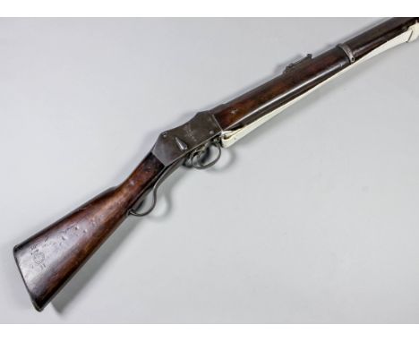 A good .450 calibre B.S.A. Martini action rifle with 32.5ins rifled barrel, the Martini action stamped with crown over V.R., 