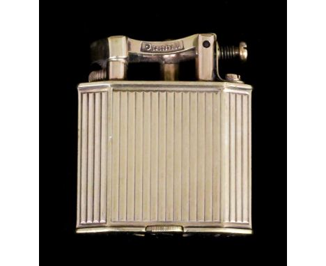 A vintage Dunhill 9ct gold cigarette lighter with reeded angled body, 1.75ins x 1.75ins (gross weight 45 grammes)
