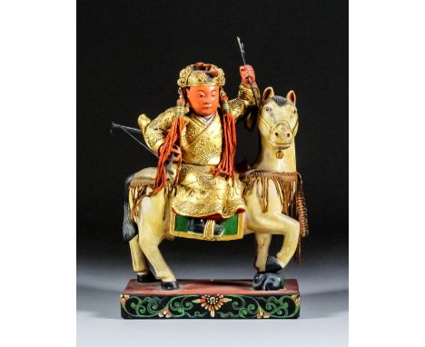 A Chinese carved polychrome and giltwood figure of Jiang Jin on horseback, his left hand raised and holding an arrow, a bow i