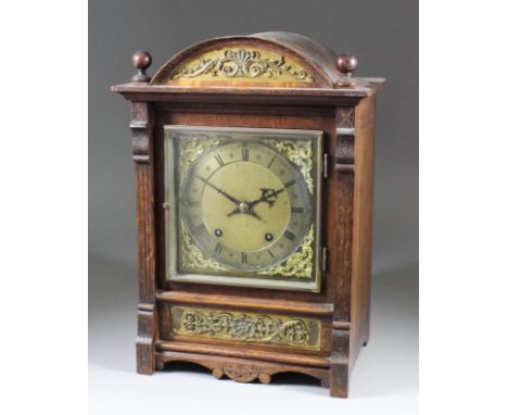 A late 19th Century oak mantel clock by Winterhalder and Hofmeier, the square brass dial with 5.75ins diameter silver chapter