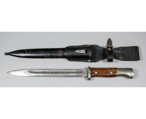 A German World War II dress bayonet, the 10ins bright steel blade heavily etched "Leibstandarte Adolf Hitler", the other side