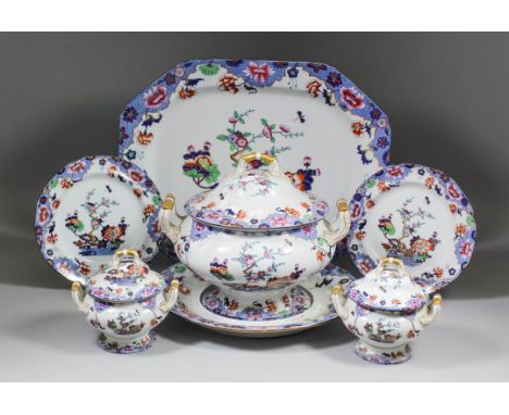 A 19th Century Spode "New Stone" dinner service, printed in blue and decorated in colours and gilt with flowering branches wi