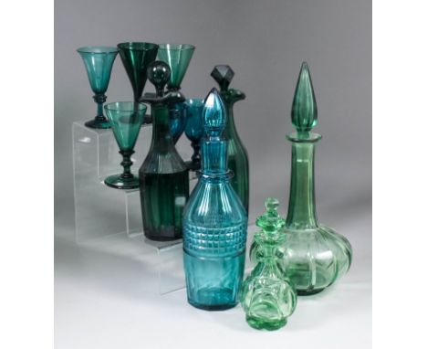 A collection of 19th Century green glassware, including a panel cut decanter and stopper, 13.5ins high, a panel cut serving b