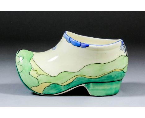 A Clarice Cliff "Bizarre" pottery "Blue Firs" pattern clog ornament, 6ins x 2.75ins high (Wilkinson back stamp - hairline cra