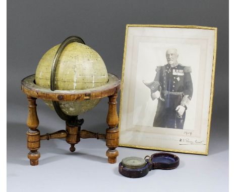 "The Cust's Star-Finder" - An early 20th Century 6ins diameter celestial globe with composition body and printed gauzes showi