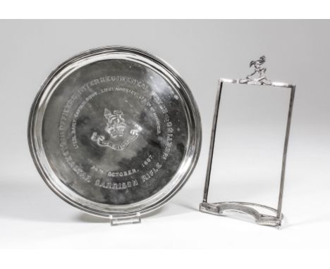 A late Victorian silver "The Queen's Own Royal West Kent Regiment" circular salver with moulded rim and on three bun feet, 8.