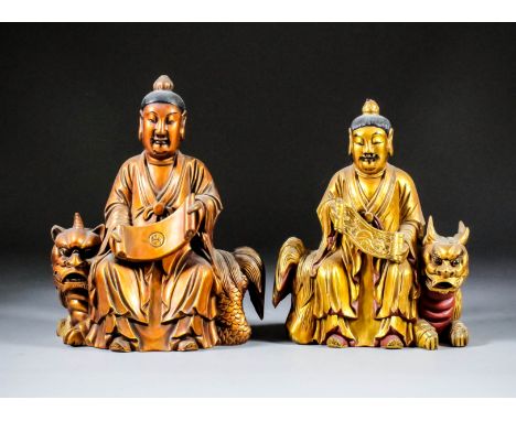 Two Chinese carved, lacquer and giltwood seated figures of San Qing Dao Zu, the Three Pure Ones - Daoist Immortals, each seat