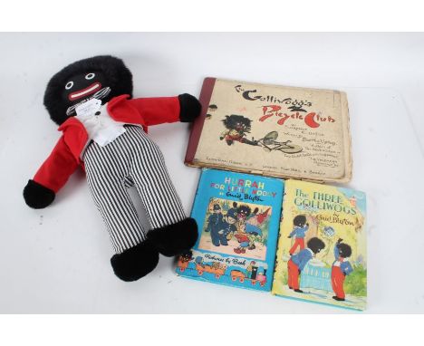 Two Enid Blyton books to include 'Hurrah For Little Noddy', another by Florence K. Upton, and a 'Cute 'n' Soft' toy (4)