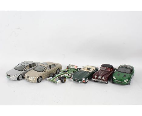 A Beanstalk Group Jaguar XKR 1/18 scale in green, Maisto Jaguar X-Type 1/18 scale in silver, Maisto Jaguar S-Type 1/18 scale 