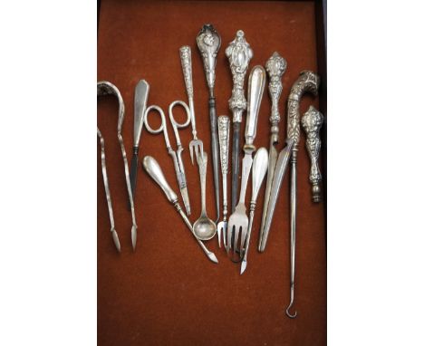 Majority silver handled button hooks & other utensils 