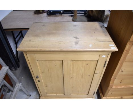 A vintage stripped pine pot cupboard