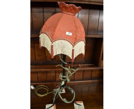 A wrought iron table lamp